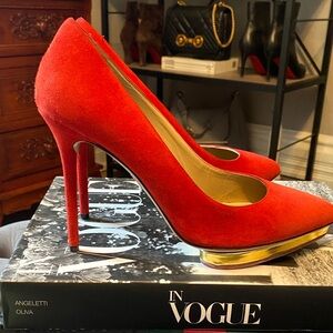 Beautiful Charlotte Olympia shoes. Red suede made in Italy.